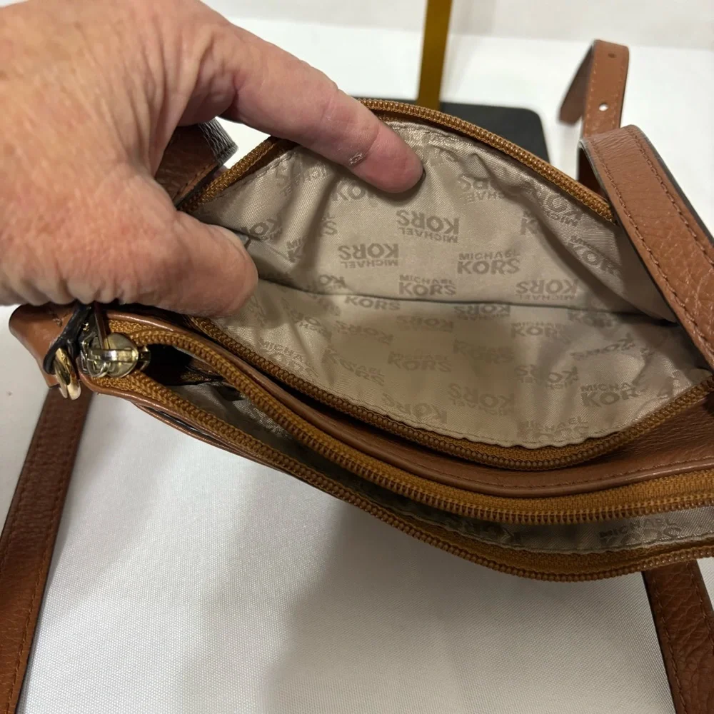Michael Kors brown leather crossbody bag with gold-tone hardware